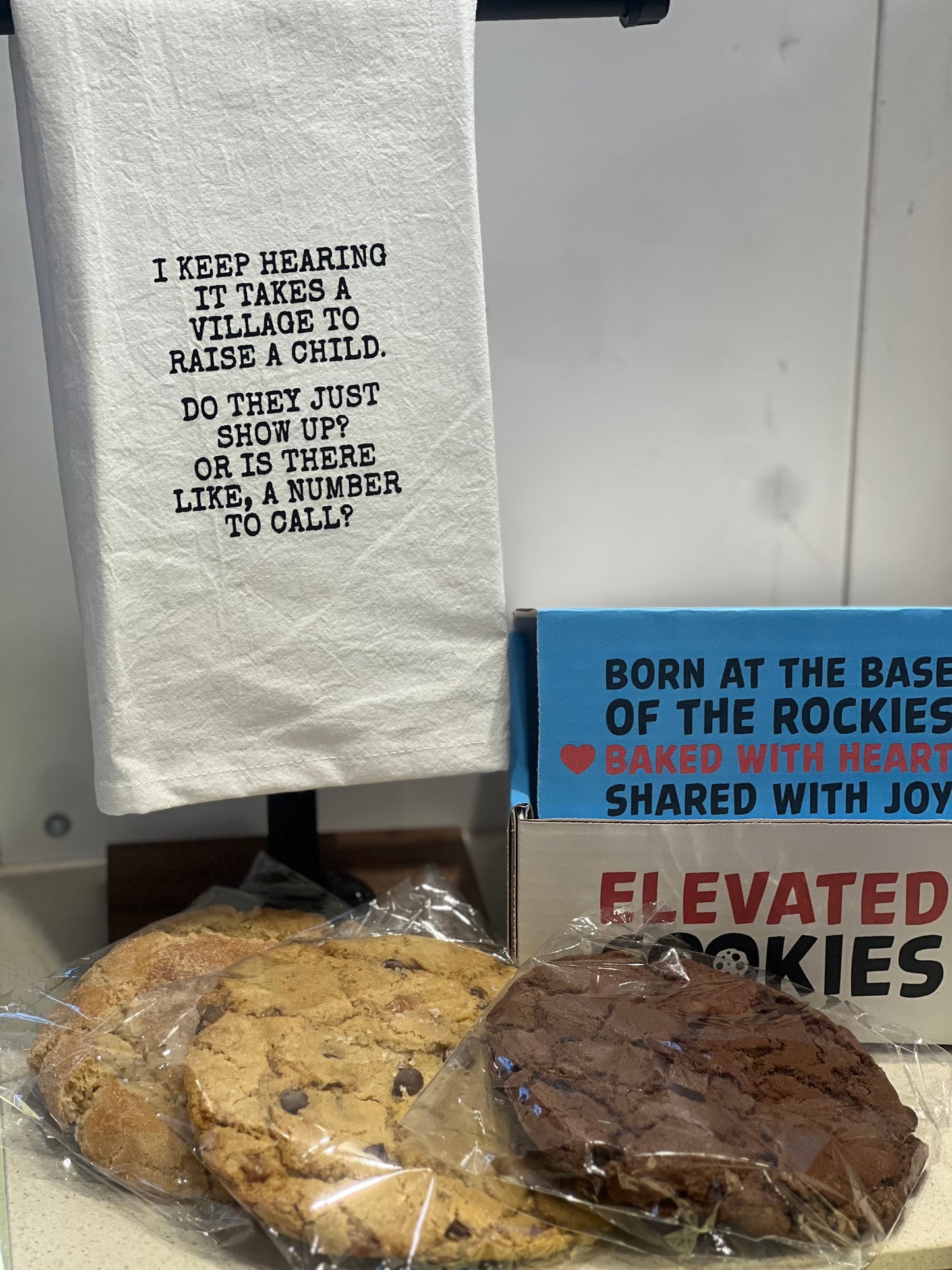 Towel with text, cookies, and a gift box